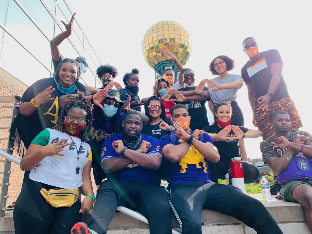 NPHC picture in front of sunsphere